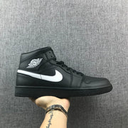 Air Jordan 1 Mid Black White Sneakers 554724-049