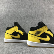 Air Jordan 1 Mid Black and Yellow Sneakers