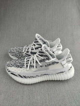Yeezy 350 V2 Knit Sneakers in Black and White