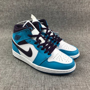Air Jordan 1 Mid Sneakers in Blue, White and Black
