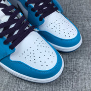Air Jordan 1 Mid Sneakers in Blue, White and Black
