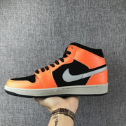 Air Jordan 1 Mid Sneakers Black Orange 554724-062