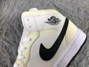 Jordan Air 1 Mid Sneakers Cream White and Black
