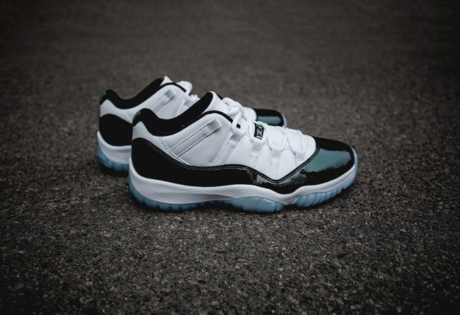 Air Jordan 11 Iridescent Sneakers in White and Black