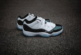 Air Jordan 11 Iridescent Sneakers in White and Black