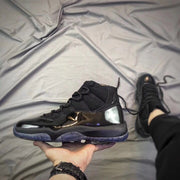 Air Jordan 11 Cap and Gown Black High-Top Sneakers