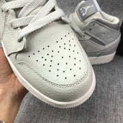 Air Jordan 1 Mid Sneakers in White and Grey