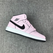 Air Jordan 1 Mid Pink and Black High-Top Sneakers
