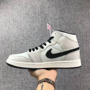 Air Jordan 1 Mid Grey and Black High-Top Sneakers
