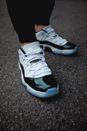 Air Jordan 11 Iridescent Sneakers in White and Black