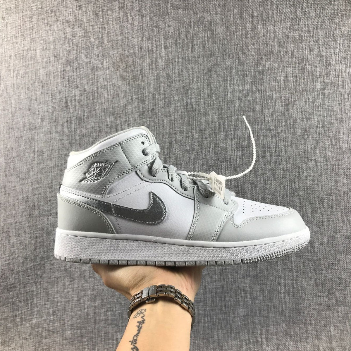 Jordan Air Jordan 1 Mid GS White and Silver Sneakers