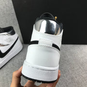 Air Jordan 1 Mid White and Black Sneakers