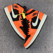 Air Jordan 1 Mid Shattered Backboard Sneakers, Black and Orange