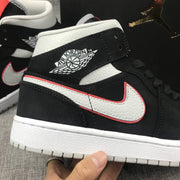 Air Jordan 1 Mid Black, White & Red Sneakers 554724-060