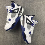 Jordan Air Jordan 4 Sneakers in White, Black and Blue