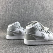 Jordan Air Jordan 1 Mid GS White and Silver Sneakers