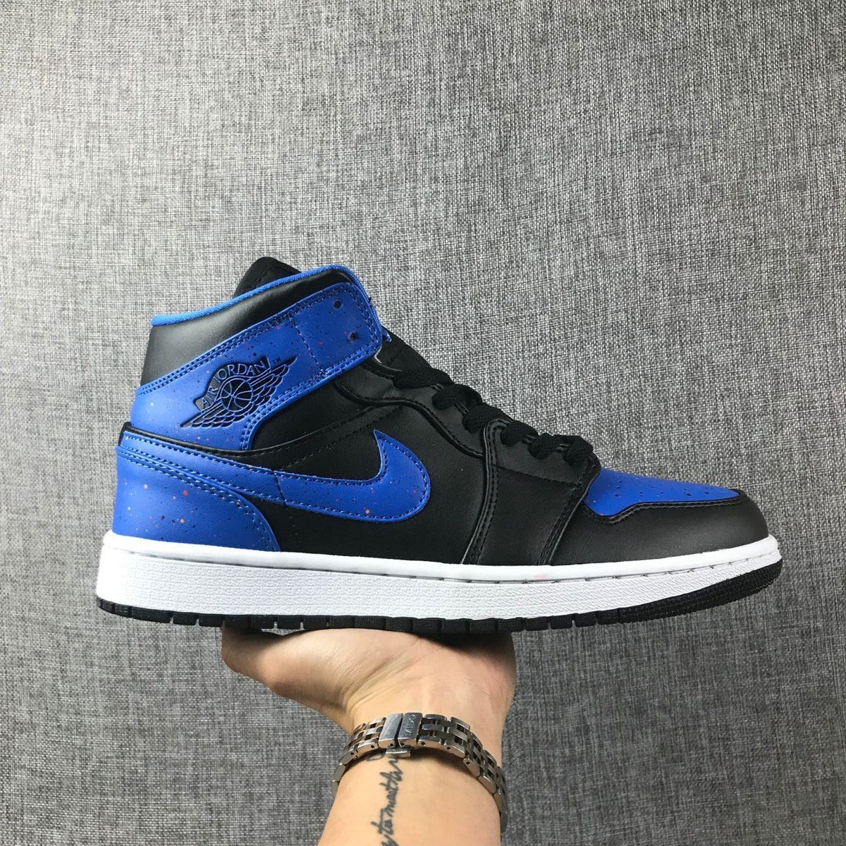 Air Jordan 1 Mid Black and Blue High-Top Sneakers