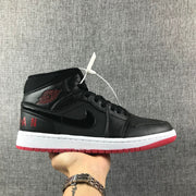 Air Jordan 1 Mid Black Red White High-Top Sneakers