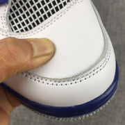 Jordan Air Jordan 4 Sneakers in White, Black and Blue