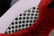Air Jordan 11 Retro Bred Black and Red High-Top Sneakers