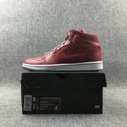 Jordan 1 Mid High-Top Sneakers in Red and Grey