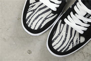 Jordan Air Jordan 1 Mid Zebra Print Sneakers Black White