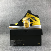 Air Jordan 1 Mid Black and Yellow Sneakers