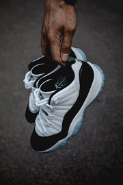 Air Jordan 11 Iridescent Sneakers in White and Black