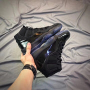 Air Jordan 11 Cap and Gown Black High-Top Sneakers