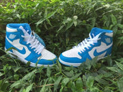 Air Jordan 1 High Sneakers in Blue and White