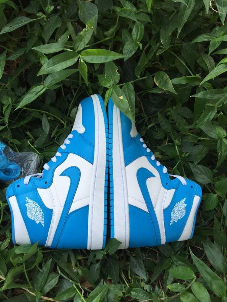 Air Jordan 1 High Sneakers in Blue and White