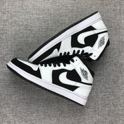 Jordan Air Jordan 1 Mid Black White Sneakers 554724-113