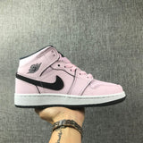 Air Jordan 1 Mid Pink and Black High-Top Sneakers