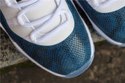 Air Jordan 11 Low Navy Snakeskin Sneakers