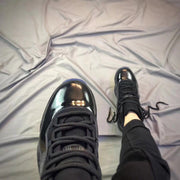 Air Jordan 11 Cap and Gown Black High-Top Sneakers