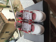 Jordan 4 Retro White and Red High-Top Sneakers