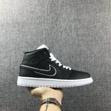 Air Jordan 1 Mid Black and White Sneakers 852542-016