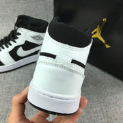 Jordan Air Jordan 1 Mid Black White Sneakers 554724-113
