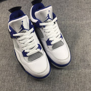 Jordan Air Jordan 4 Sneakers in White, Black and Blue