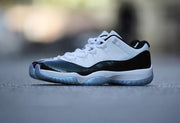 Air Jordan 11 Iridescent Sneakers in White and Black