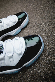 Air Jordan 11 Iridescent Sneakers in White and Black