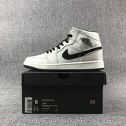 Air Jordan 1 Mid Grey and Black High-Top Sneakers