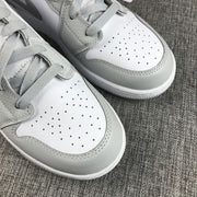 Jordan Air Jordan 1 Mid GS White and Silver Sneakers