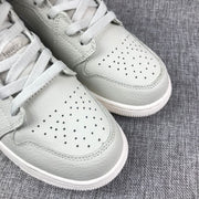 Air Jordan 1 Mid Sneakers in White and Grey
