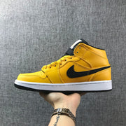 Air Jordan 1 Mid University Gold Black White Sneakers