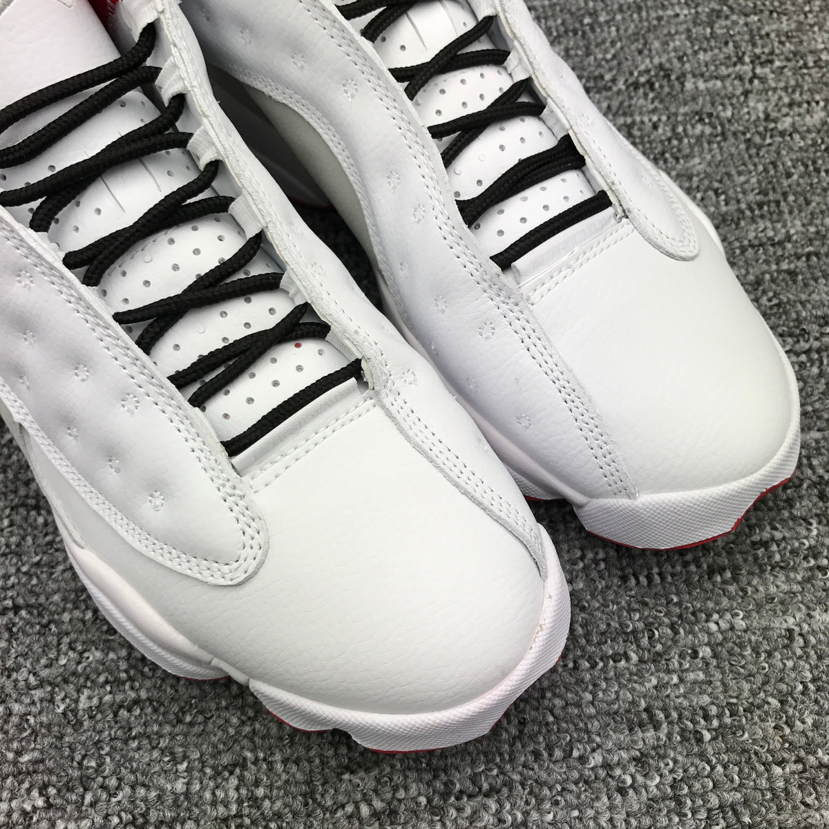 Air Jordan 13 White and Red High-Top Sneakers