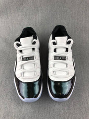 Jordan 11 Low Sneakers in White and Black