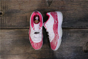 Air Jordan 11 Retro Low Pink Snakeskin Women's Sneakers