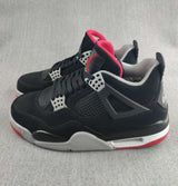 Jordan 4 Retro Sneaker in Black, Red and White