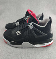 Jordan 4 Retro Sneaker in Black, Red and White